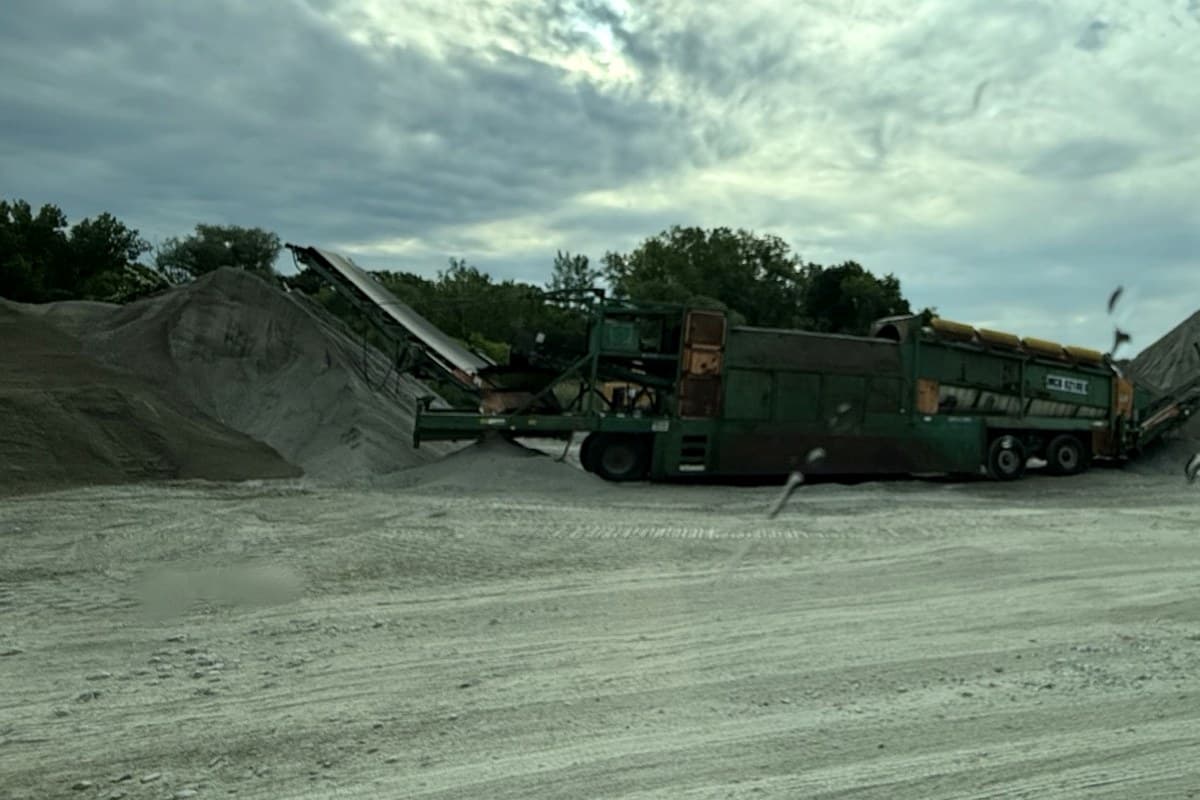 Screening plant processing and grading gravel on site
